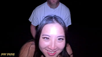 Late-night beach escapade featuring public oral and cunnilingus with an Asian amateur